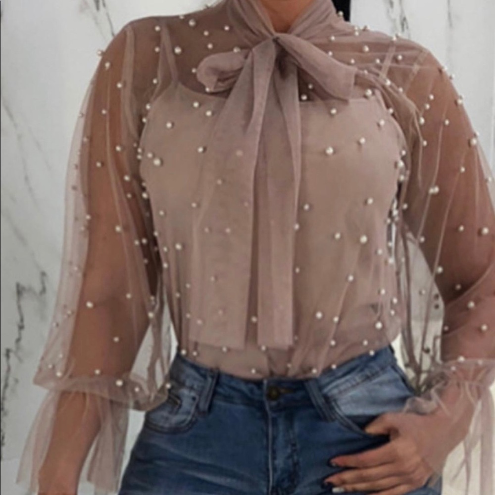 Pink with pearl blouse.